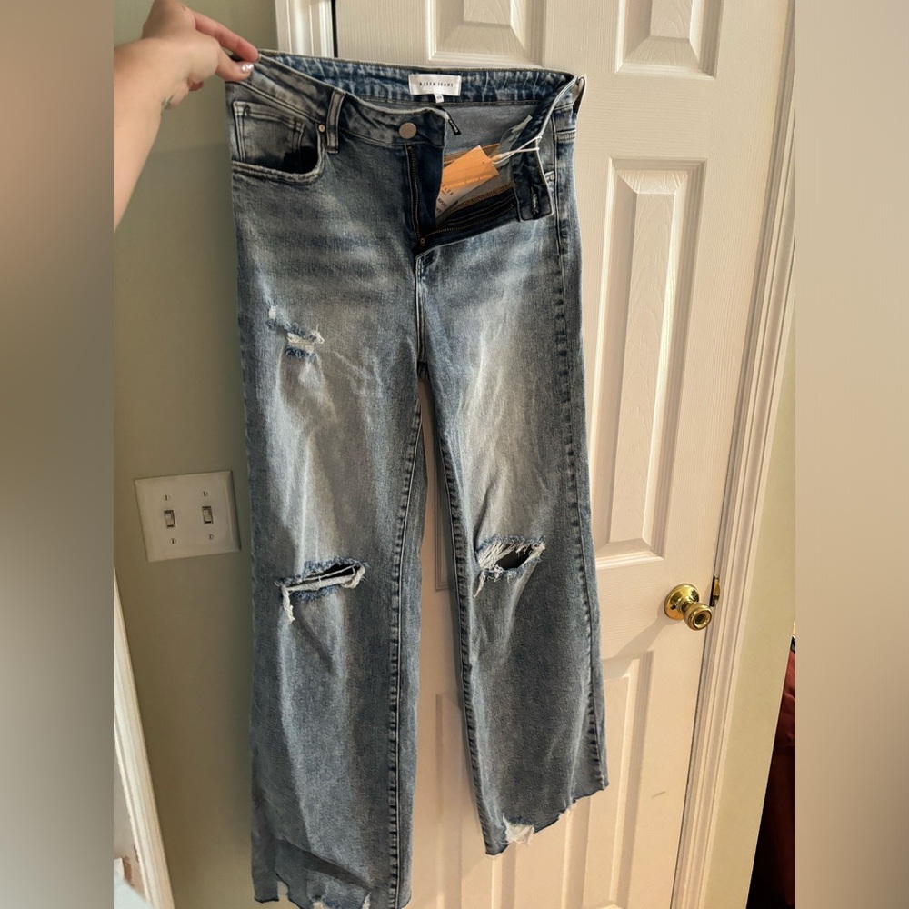 Size 13/31 semi “destroyed” flare stretch jeans. Very soft. Never worn. Tags on
